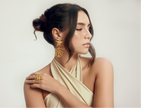 Aretes Estrella Coral en bronce con baño de oro de 24 kt de 5 micras